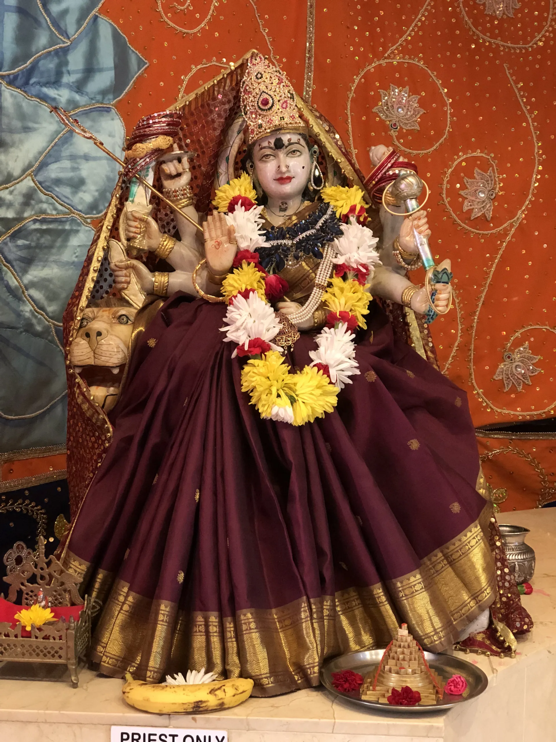 Murti of Maa Durga, adorned with garlands, enshrined at the temple