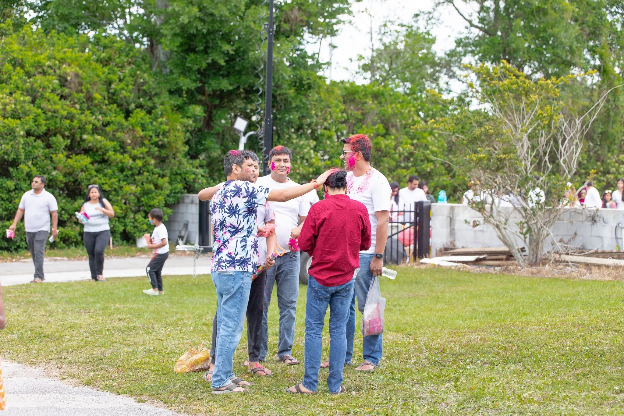 The temple community gathered for Holi